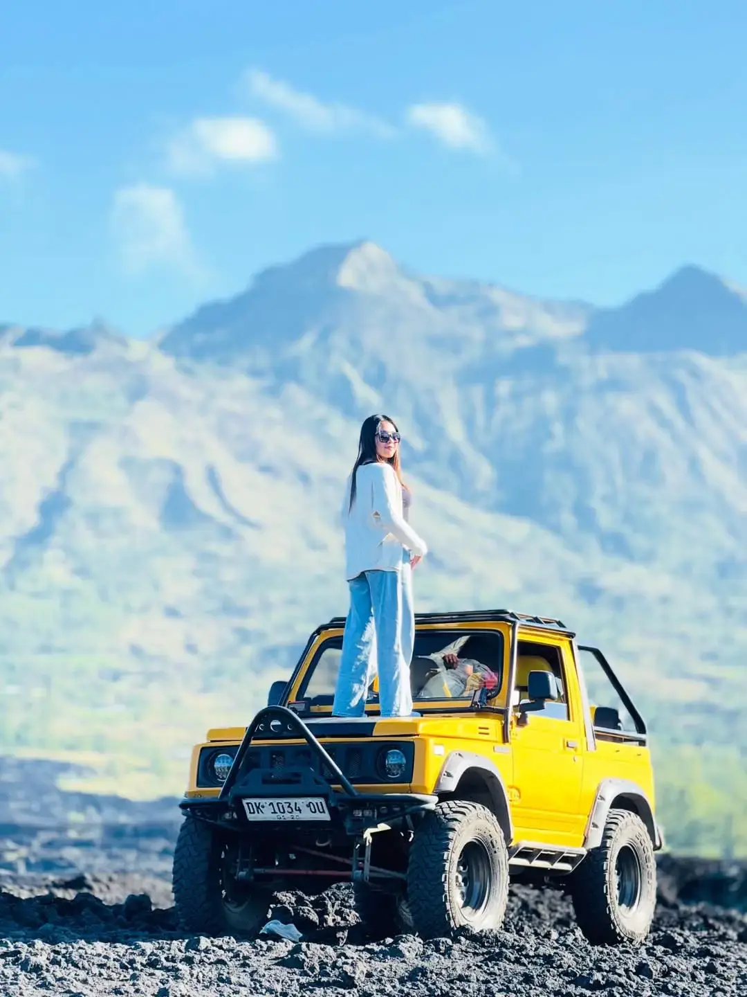 4WD jeep climbing volcanic tracks before dawn
